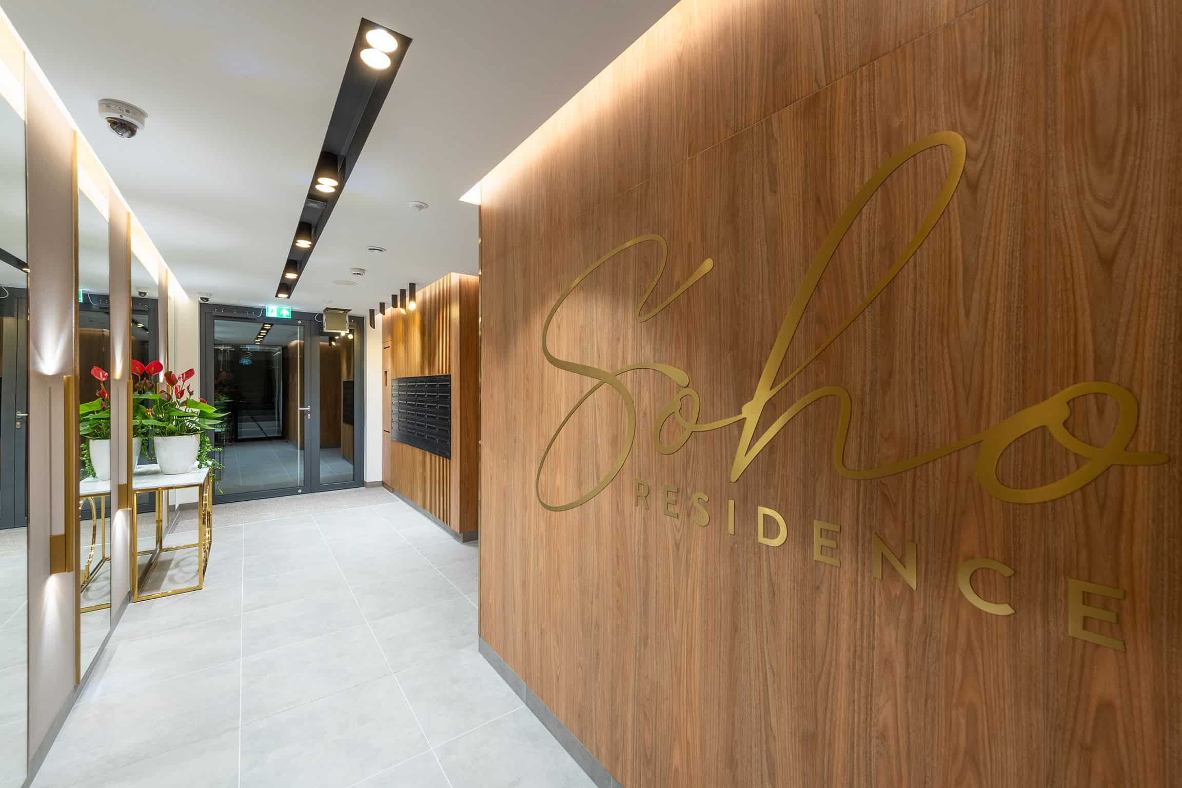Nowoczesne lobby w inwestycji Terra Casa SoHo Residence II, eleganckie wnętrza.